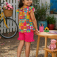 Girls Color Pop Cotton Co-Ord Set – Multicolor Printed Top & Pink Ruffle Shorts